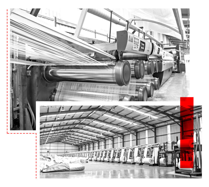 Factory interior with rolls of polywoven material ready for production